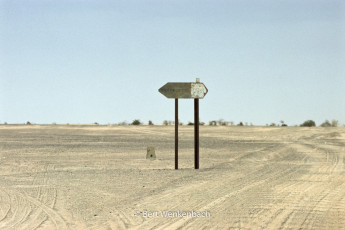 On the Tanezrouft piste between Gao and Tessalit, a signpost is indicating the road to Timbuktu