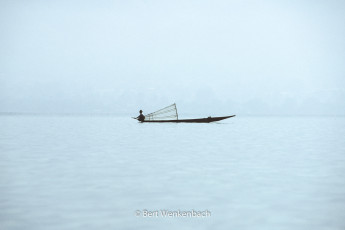 A fisherman of the Intha People with his typical basket that serves as a fishnet